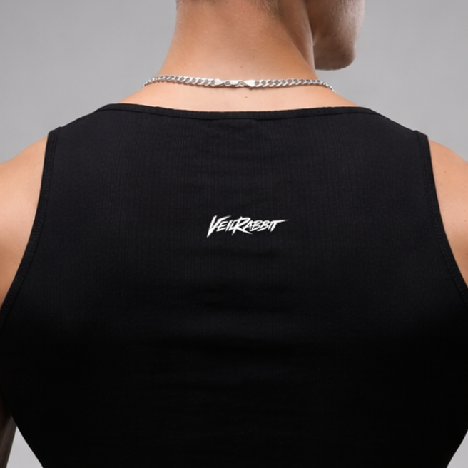Man wearing a black tank top with 'Veil Resist' logo on a gray background